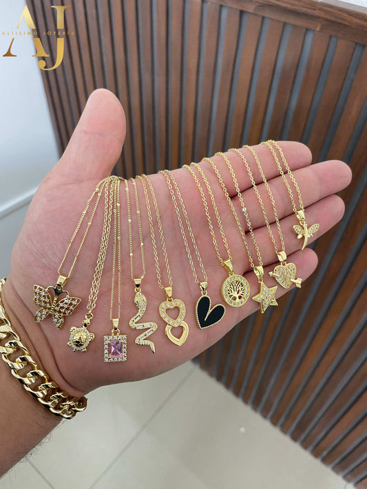 10 Cadenas + Dijes Surtidos